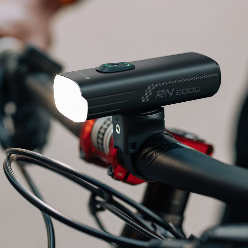 Olight RN 2000 Rechargeable 2000 Lumen Front Bike Light with Light Sensor, Vibration Sensor, and Wireless Remote Control